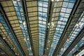 Passengers reflection on airport hall roof Royalty Free Stock Photo