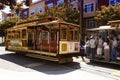 Passengers ride in a cable car