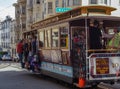 Passengers ride in a cable car in San Francisco,USA. Royalty Free Stock Photo