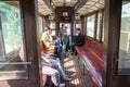 Passengers ride in an old vintage tram Sanok SW-1 in the garage at the depot in Lviv