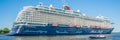 Passengers sailing into the harbor of Amsterdam on a big German cruiseship of TUI Cruises Royalty Free Stock Photo