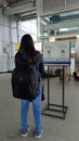 passengers scan the QR code at the station entry area