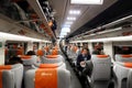 Passengers sit in the high speed trenitalia train