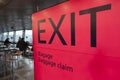 Passengers sit and wait on helsinki vantaa airport near exit and