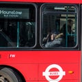 Passengers Sitting on a Red TFL Public Transport Bus Royalty Free Stock Photo