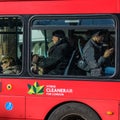 Passengers Sitting on a Red TFL Public Transport Bus Royalty Free Stock Photo