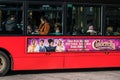 Passengers Sitting on a Red TFL Public Transport Bus