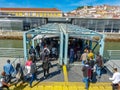 Passengers on the Soflusa boat from the city of Barreiro disembarking at Lisbon station.