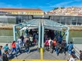 Passengers on the Soflusa boat from the city of Barreiro disembarking at Lisbon station.