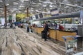 Passengers stand in line waiting for check-in at Singapore Changi Airport Royalty Free Stock Photo