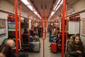 Passengers in subway train interior Royalty Free Stock Photo