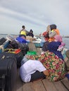 Passengers take small boats, from Balikpapan to Penajam, East Kalimantan, Indonesia