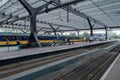 Passengers on their way to an almost departing train, Rotterdam