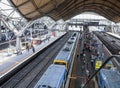Passengers and Train at Southern Cross Station, Melbourne, Australia. Royalty Free Stock Photo