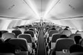 Passengers traveling by a plane, shot from the inside of an airplane Royalty Free Stock Photo