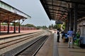 Passengers wait on platform for Colombo bound train at Jaffna Railway Station Sri Lanka Royalty Free Stock Photo