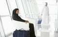 Passengers waiting in airport departure lounge Royalty Free Stock Photo