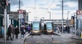 Passengers waiting for an electric tram in Dublin, Ireland