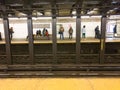 passengers waiting for the subway at Grand Station, Brooklyn, New York