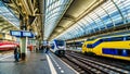 The busy train station of Amsterdam Centraal in the Netherlands