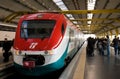 Passengers waiting to board the Leonardo Express from Rome Fiumicino Airport Station