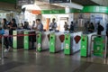 BANGKOK, THAILAND - 5 JUNE 2018: Passengers and security at entry and exit gate with key card access control into BTS Sky train