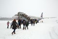 Passengers walking on the airfield. Sheremetyevo Airport, Moscow, Russia. Royalty Free Stock Photo