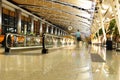 Passengers walking in an airport terminal