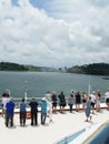 Passengers watch as cruise ship approaches the Atlantic Ocean