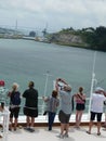 Passengers watch as cruise ship approaches the Atlantic Ocean