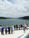 Passengers watch as cruise ship approaches the Atlantic Ocean