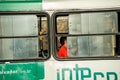 Passengers wearing a protective mask against covid inside a public bus in the city of Salvador, Bahia