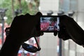 Passerby Photographs a Red-Shirt Rally in Bangkok