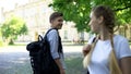 Passers by looking at each other and smiling, love at first sight, pick up Royalty Free Stock Photo