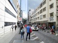 Passersby walking down one of the cross streets on the Boulevard de Sabana Grande, Caracas, Venezuela