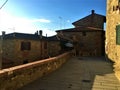 Passignano sul Trasimeno ancient town, Umbria region, Itlay. Ancient alley, arch and flowers Royalty Free Stock Photo