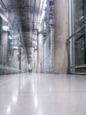 Passing daylight inside office building on modern glass building interior corridor Royalty Free Stock Photo