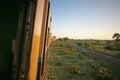 Passing through empty countryside in Burma on the Burmese Railways Yangon to Mandalay train