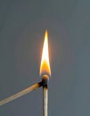 Passing the Flame from One Match to Another Royalty Free Stock Photo
