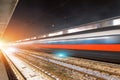 Passing on the high speed train station by night Royalty Free Stock Photo