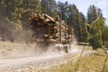 Passing logging truck Royalty Free Stock Photo