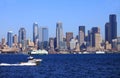 A passing power boat and the Seattle skyline. Royalty Free Stock Photo