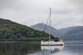 Passing Sailing Boat in Inveraray Royalty Free Stock Photo