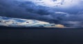 A passing storm above the bay