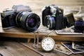 The passing of time measured by the clock hands and the technological progress of the cameras Royalty Free Stock Photo