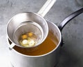 Passing the vegetables through a sieve