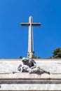 The passion of Christ statue and the big cross on the top of the Valley of the Fallen Valle de Los Caidos, Madrid, Spain Royalty Free Stock Photo