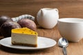 Passion fruit cheesecake and a cup of coffee