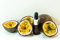 Passion fruit essential oil in a brown glass bottle, alternative medicine. Natural organic essence.