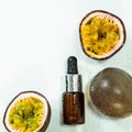 Passion fruit essential oil in a brown glass bottle, alternative medicine. Natural organic essence. Passion fruit seed oil